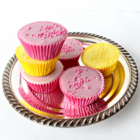 purple and yellow Peanut Butter Cups on a silver serving platter