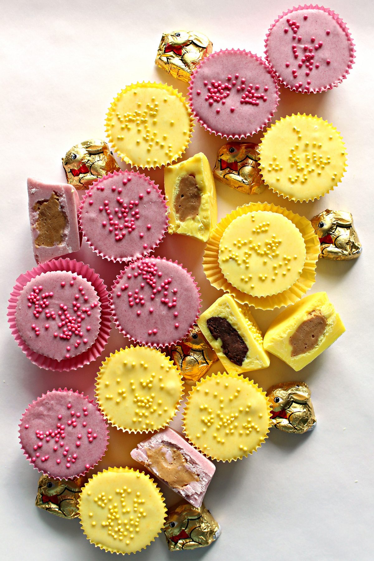 Yellow and pink peanut butter cups with matching sprinkles.