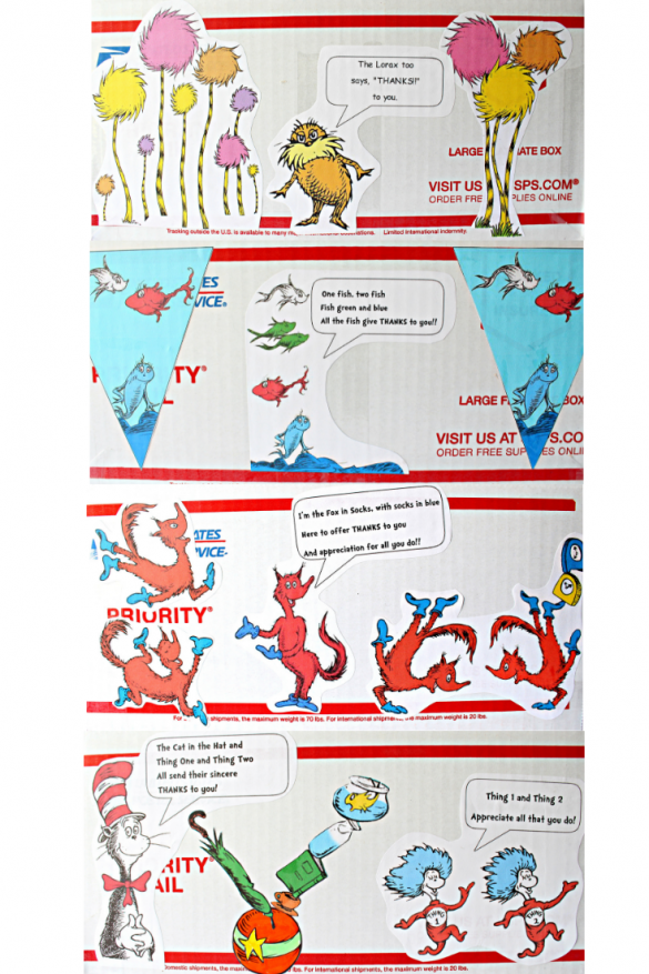 The outside of the box decorated with cut out characters from Seuss books.