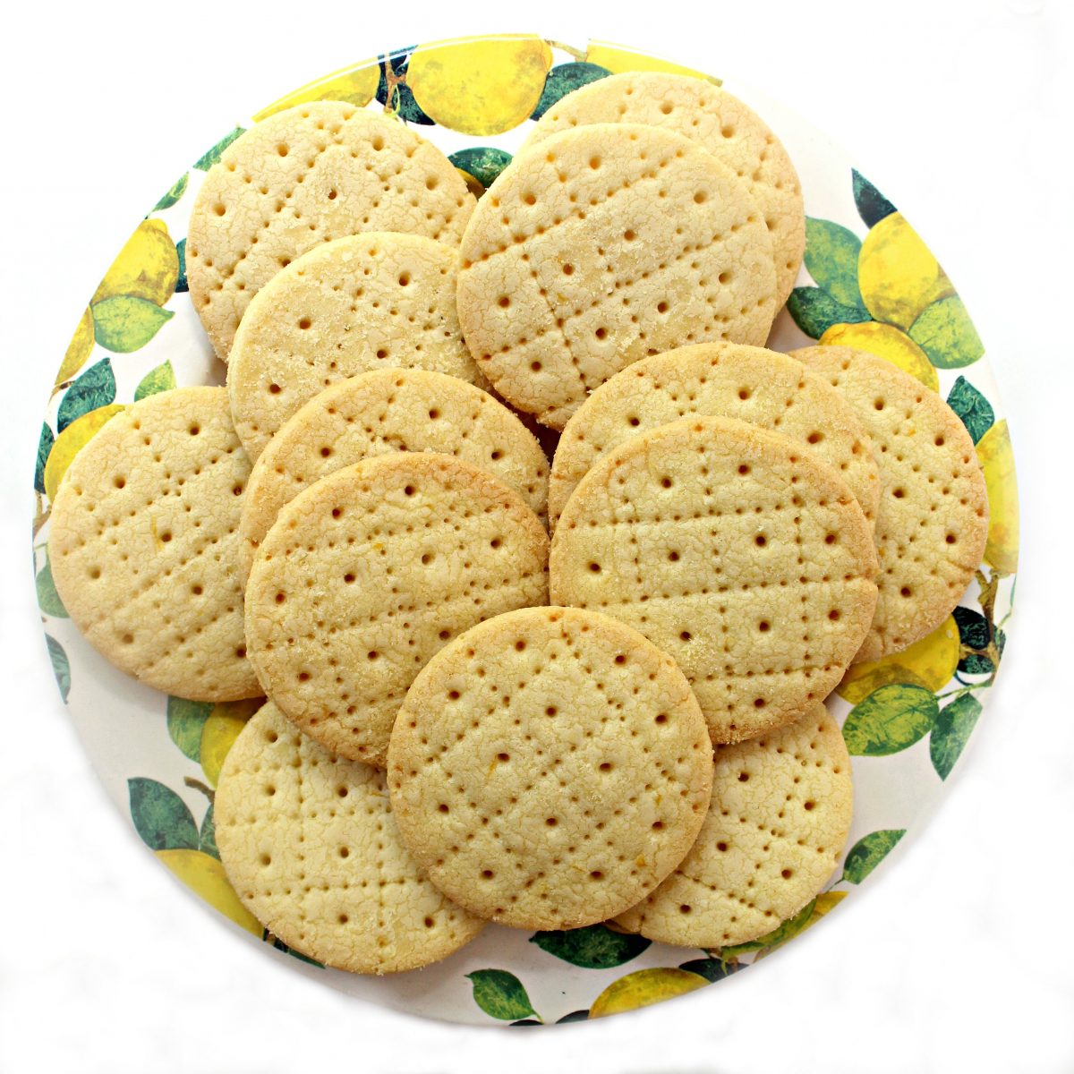Shrewsbury cookies embossed with grid lines on a round platter.