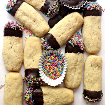 Oatmeal Shortbread fingers with one end of each dipped in chocolate and sprinkles