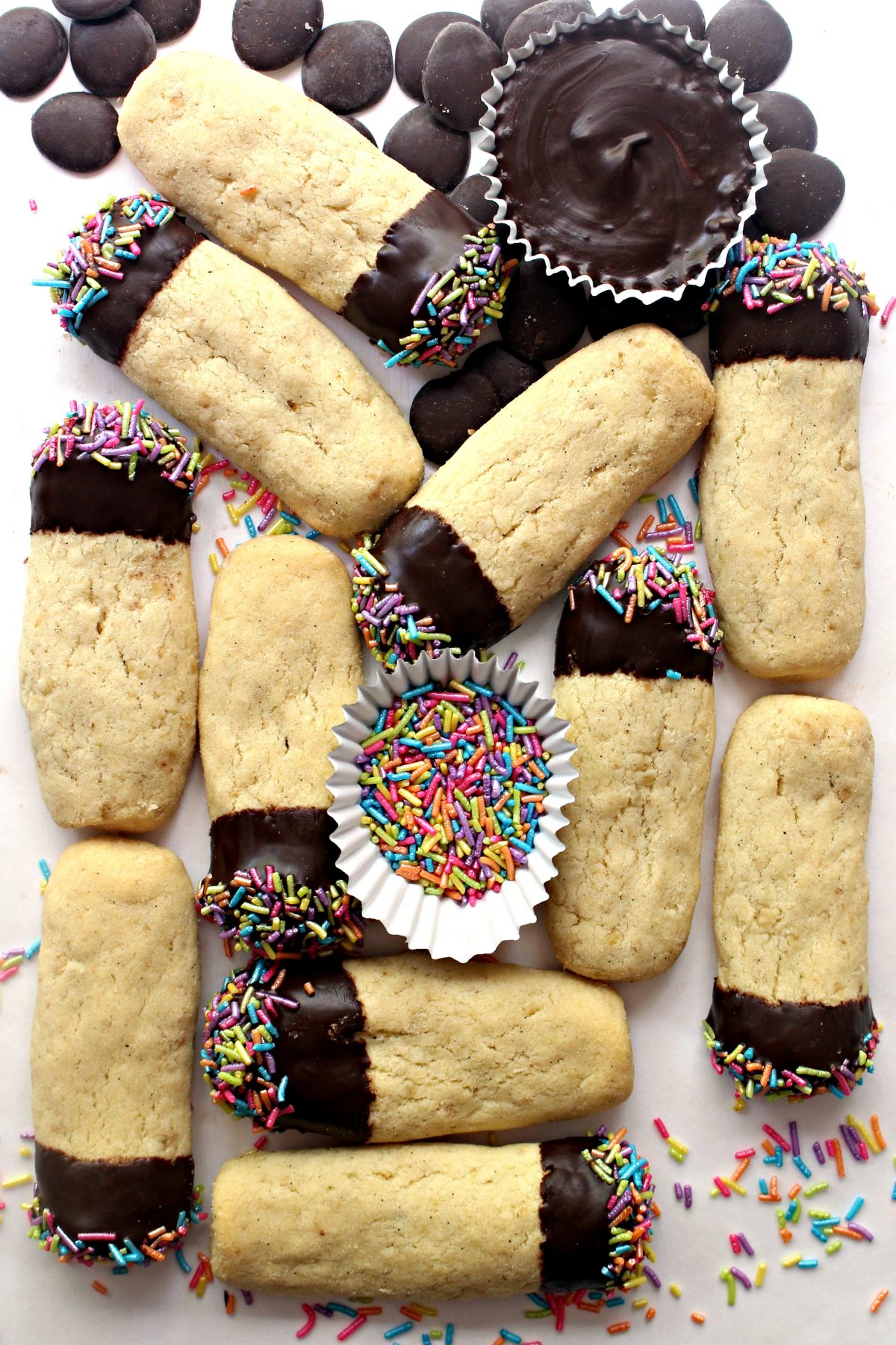 Oatmeal Shortbread fingers with one end of each dipped in chocolate and sprinkles.
