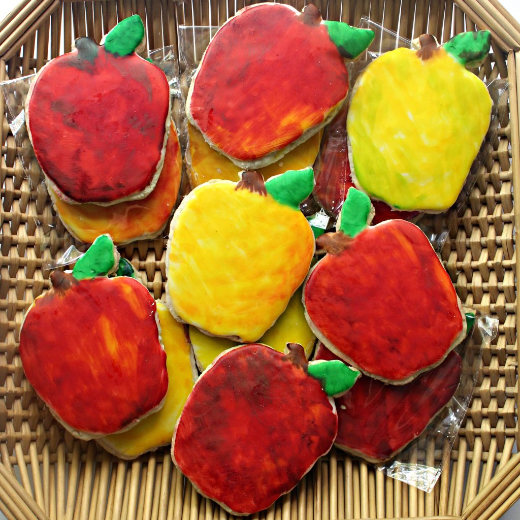 Red and yellow Apple Oatmeal Cutout Cookies in a basket.