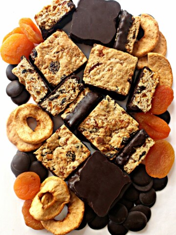 Oatmeal Fruit Bars surrounded by dried fruit and chocolate discs