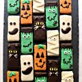 Chocolate coated graham Crackers decorated as Frankenstein, Pumpkin, Ghost, Mummy, and Cat.