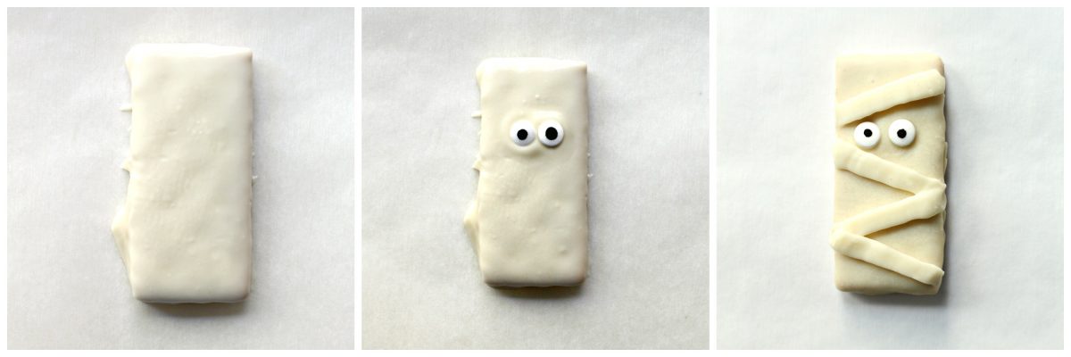 Mummy cookie decorating: white coating, candy eyes, white chocolate zigzags for mummy wrapping.