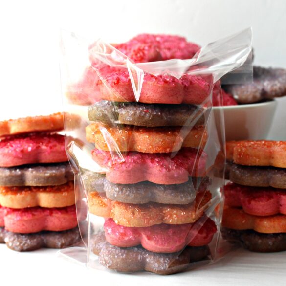 Cookies stacked  inside a cellophane gift bag. 