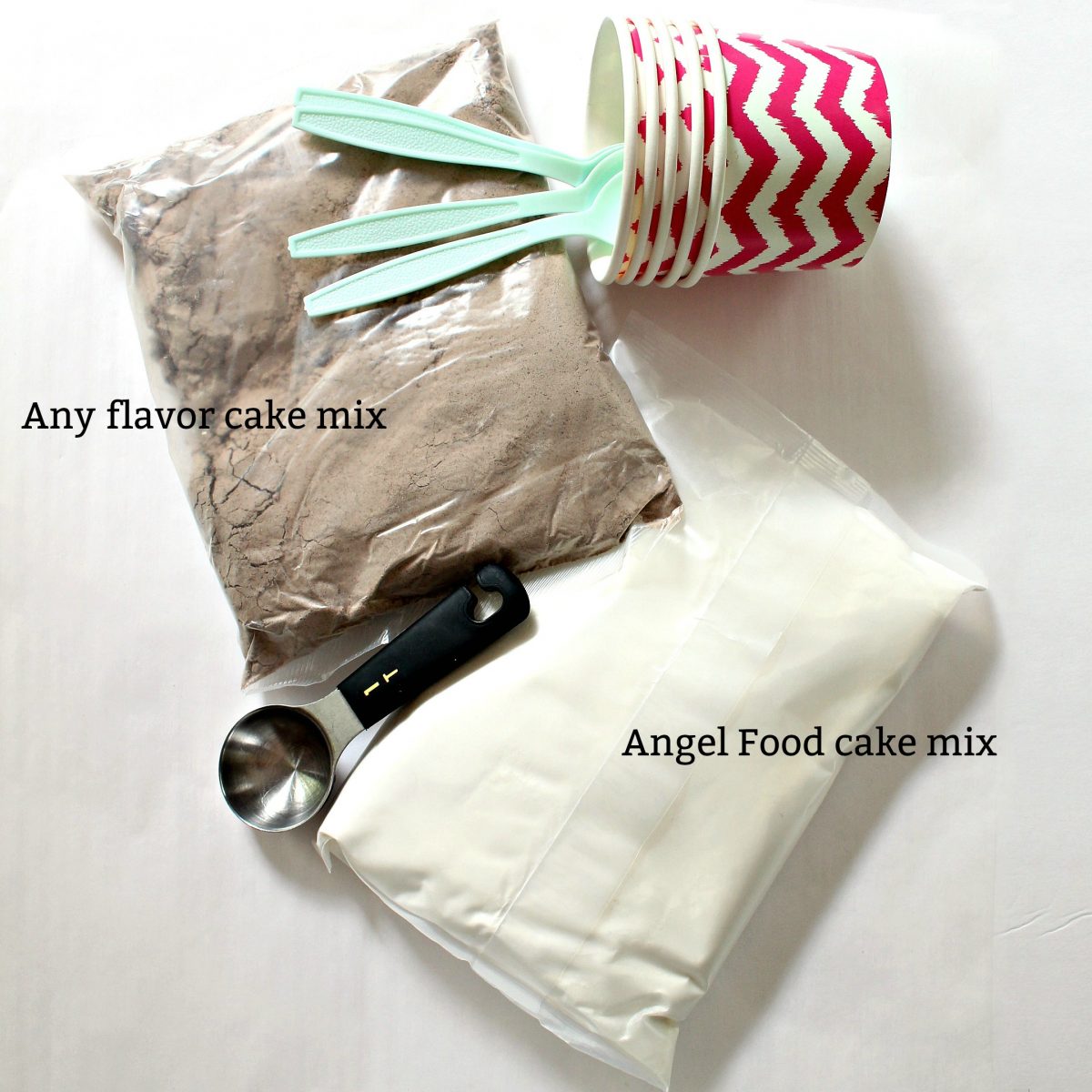 Ingredients: flavor cake mix, angel food cake mix, cups, spoons, tablespoon.