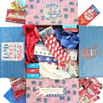 4th of July Care Package decorated and filled with decorations and foods in red, white, and blue.