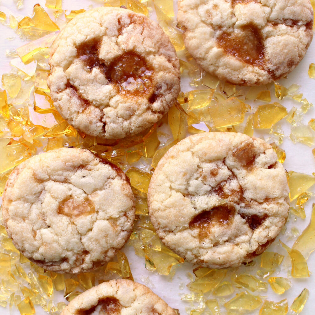 Thick, round butter cookies with chunks of caramel candy showing through the tops.