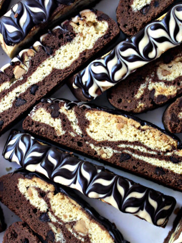 Marbled chocolate and peanut butter dough biscotti with decorated chocolate topping.