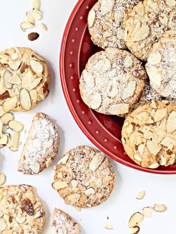 Marzipan Cookies topped with almonds or powdered sugar.