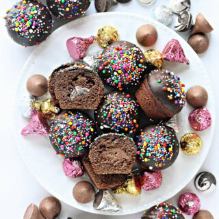 Round chocolate cookies with a chocolate candy kiss inside.