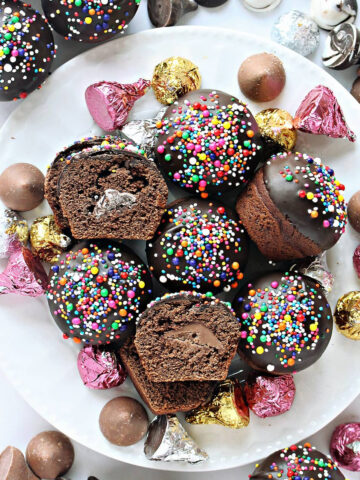 Round chocolate cookies with a chocolate candy kiss inside.