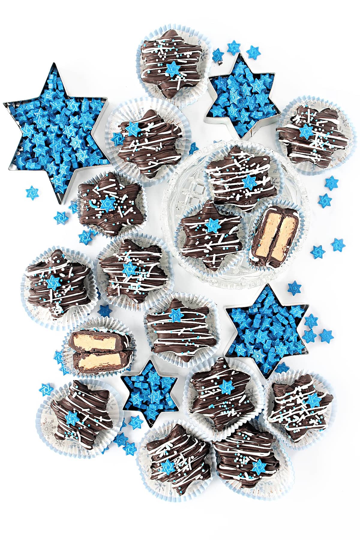 Star shaped Chocolate Peanut Butter candies with blue and white sprinkles.