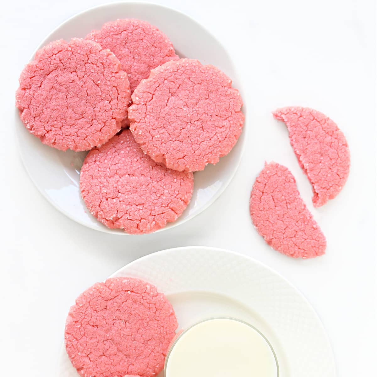 Pink polvorones cookies on a plate.