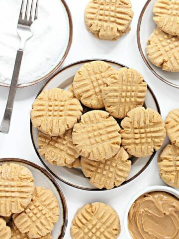 Peanut Butter Cookies with a criss cross pattern from a fork on top.