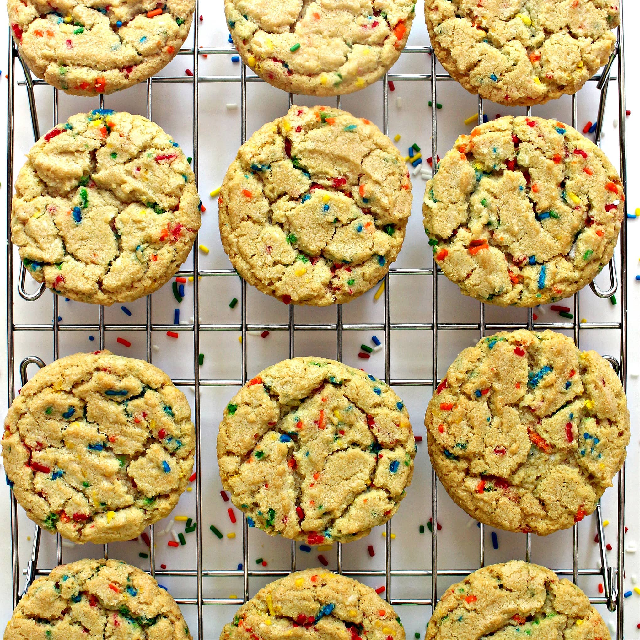 Funfetti Cookies with sprinkles in the dough on a wire cooling rack.