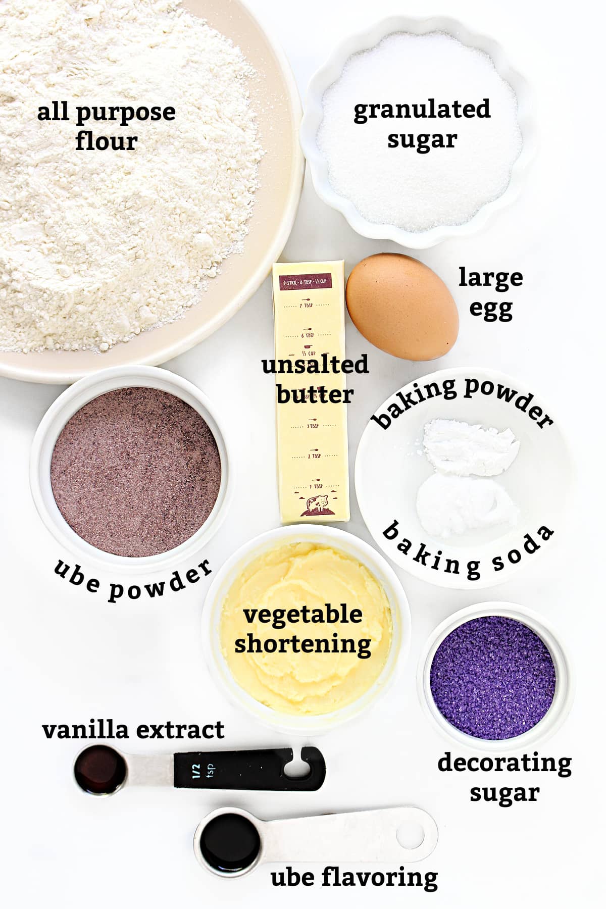 Ingredients: flour, sugar, egg, butter,  shortening, ube powder/flavor, vanilla, baking powder, baking soda, decorating sugar.
