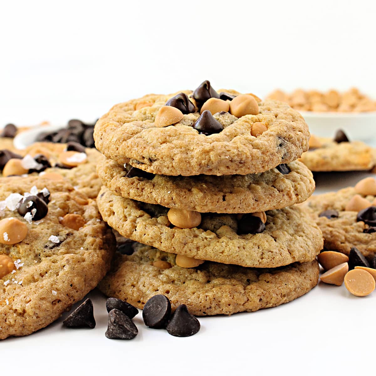 Stack of cookies topped with butterscotch and chocolate chips.
