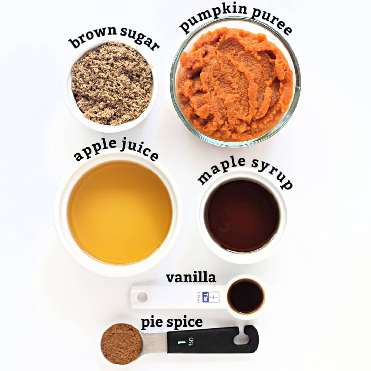 Pumpkin butter ingredients; brown sugar, pumpkin puree, apple juice, maple syrup, vanilla, pumpkin spice.