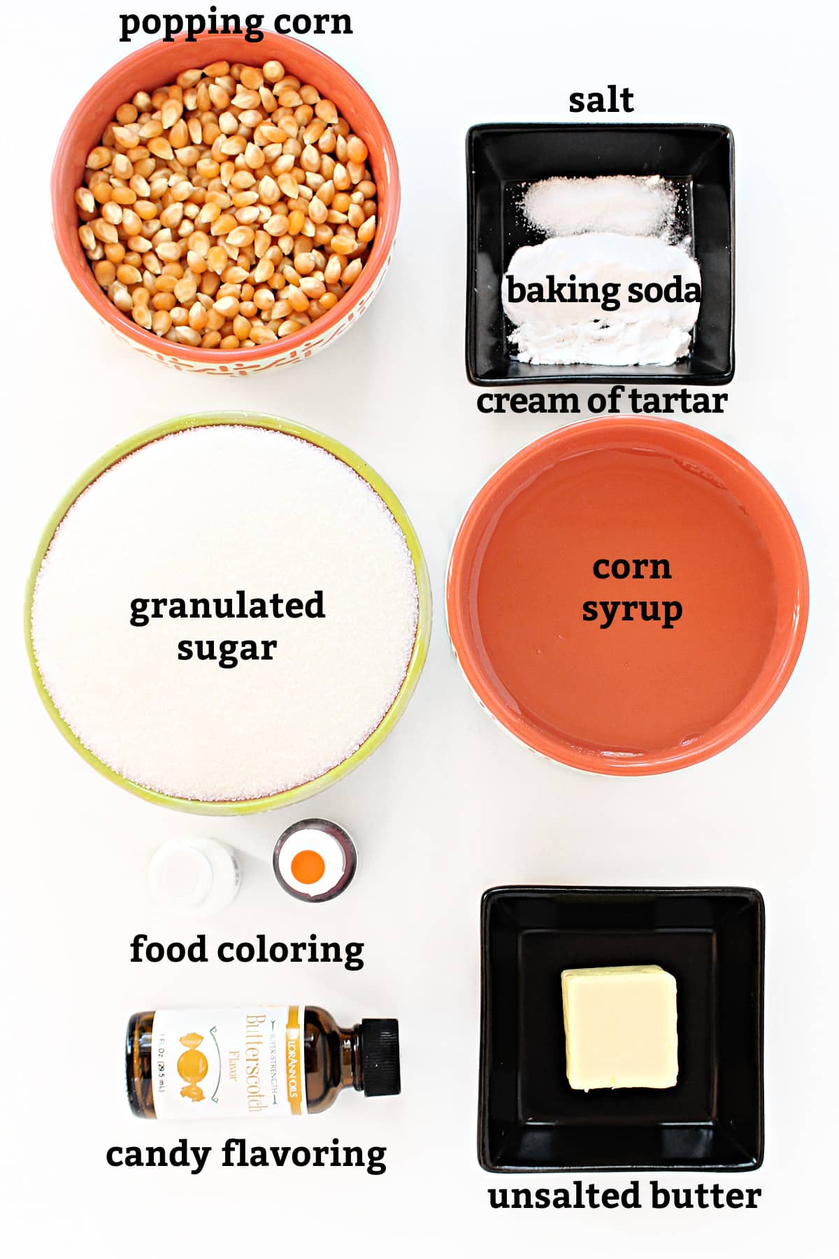 Ingredients: popcorn kernels, salt, baking soda, cream of tartar, sugar, corn syrup, food coloring, flavoring,  butter.