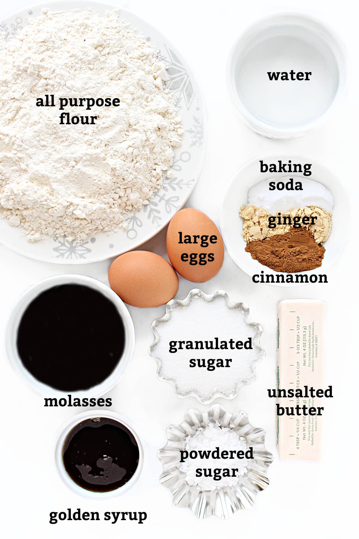 Ingredients: flour, water, eggs, baking soda, ginger, cinnamon, molasses, golden syrup, granulated sugar, butter, powdered sugar.