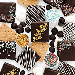 Chocolate covered Graham Cracker squares with sprinkles or white chocolate drizzles.