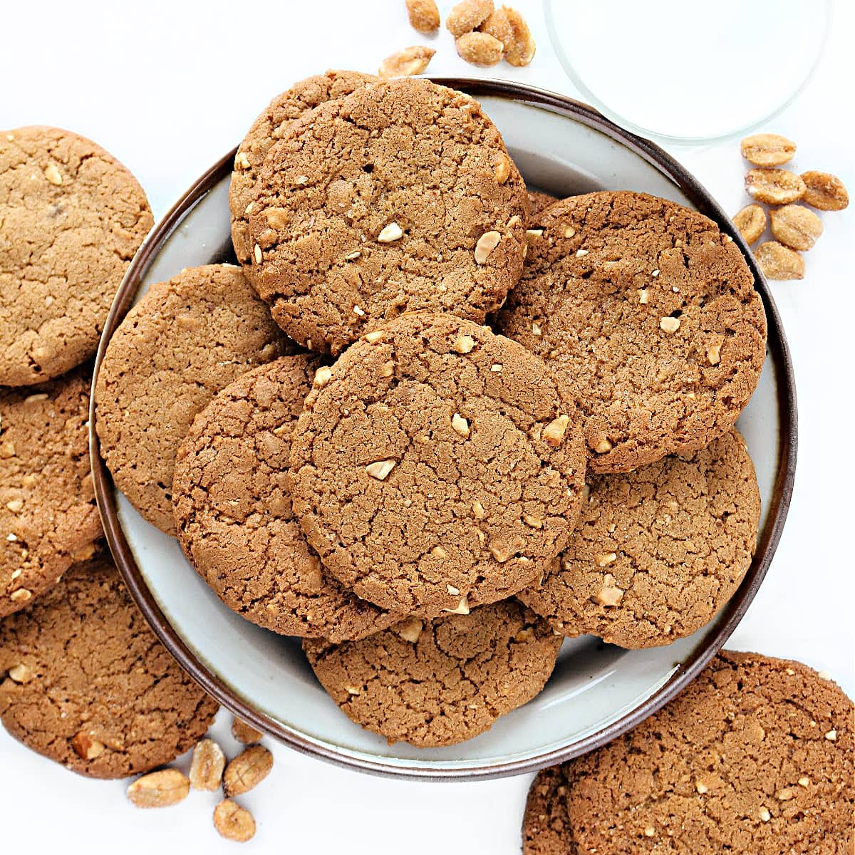 Plated Honey Roasted Peanut Cookies with chopped honey roasted peanuts in the dough.