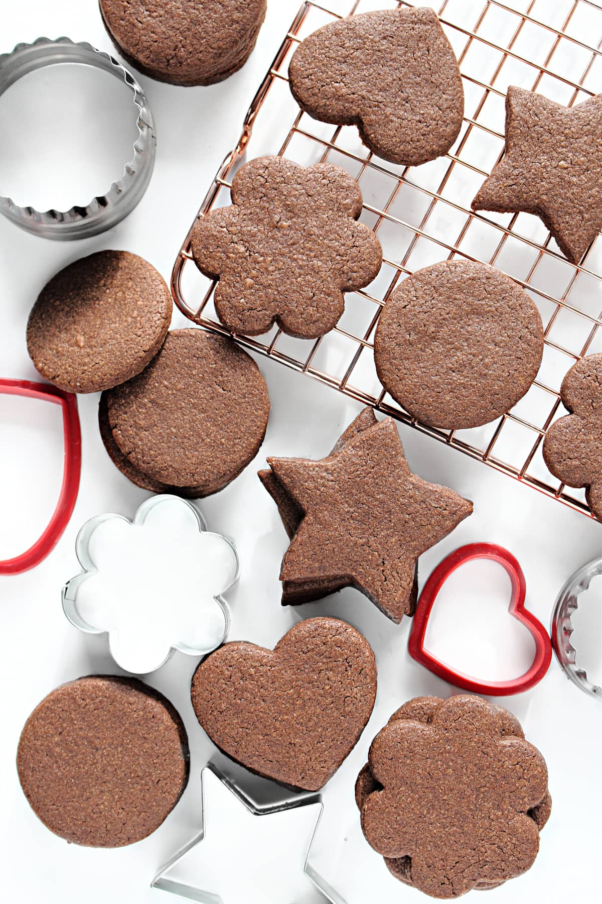 Chocolate Sugar Cookies cut out in different shapes.