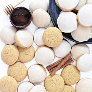 Thick, cake like Honey Cookies, some with a coating of white, lemon scented icing on top.
